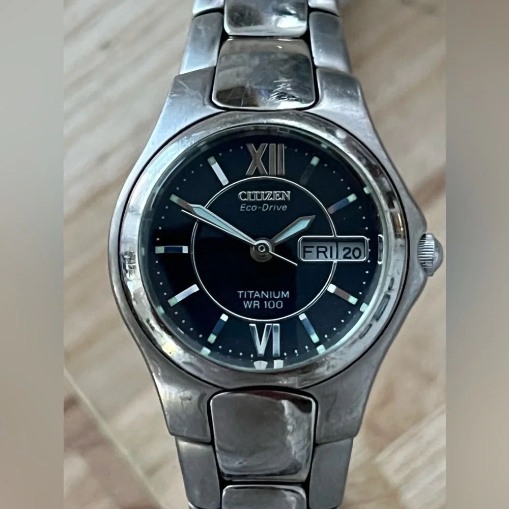 Citizen Eco-Drive Titanium Solar Black Dial Day Date Window Titanium Bracelet
